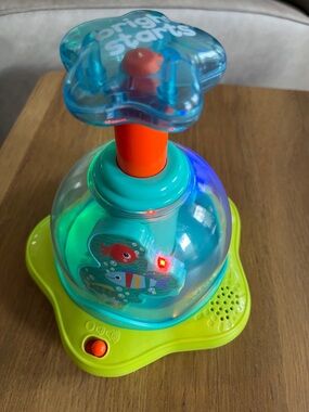 Bright Starts Blue & Green Pop Spinner Toy with Lights